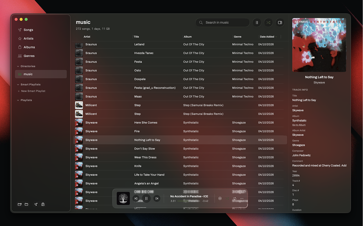 Auric music player showing a library view with album art, track list, and playback controls